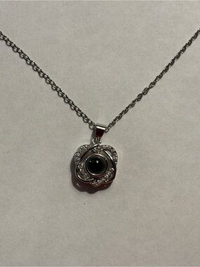 Delicate Silver Floral Pendant Necklace with Black Center Stone